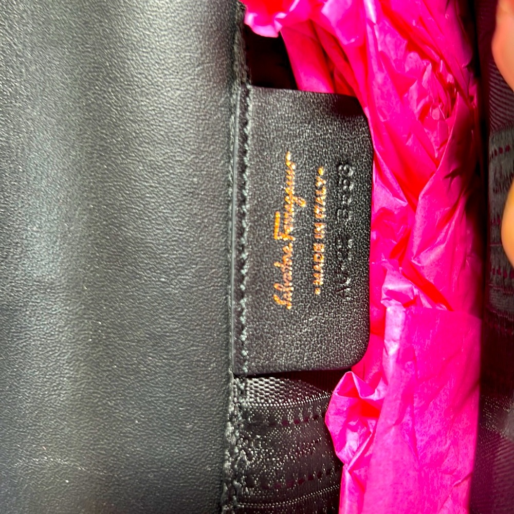 Salvator Ferragamo black shiny clutch